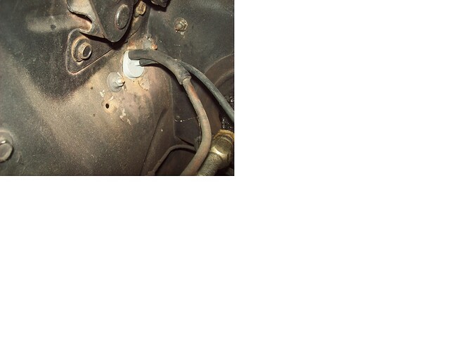 AC vacuum can inside engine compartment