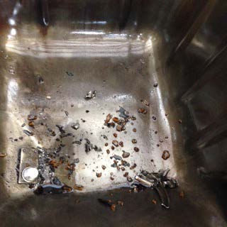 Oil pan - metal debris 1.jpg